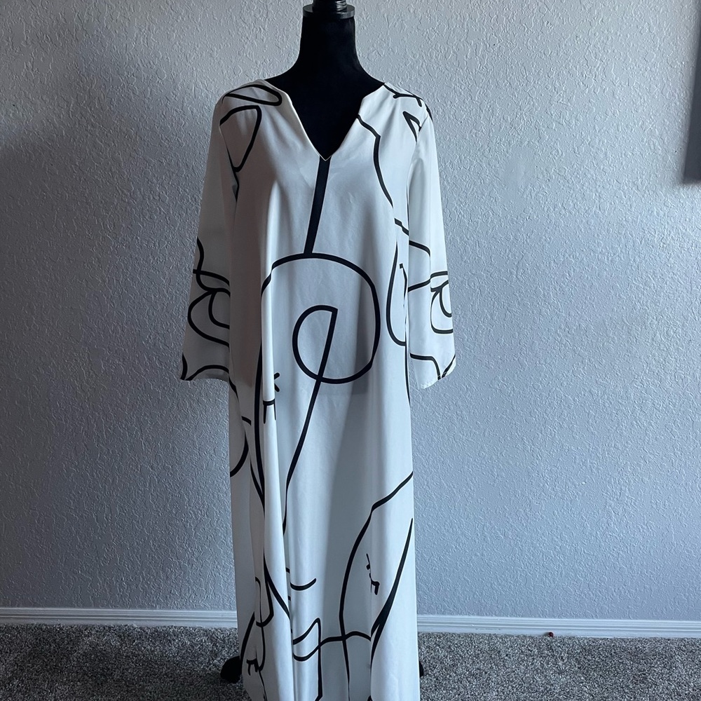 Large Asymmetrical black & white dress no brand.